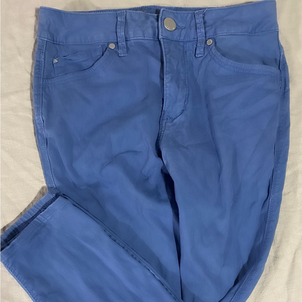 Size four, “skin-fit denim”, very soft and stretchy. Very good condition.